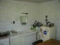 <I>A summer kitchen.</I>