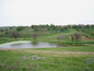 <I>There is a small lake 5 km away</I>