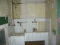 <I>The summer kitchen.</I>