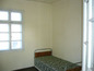 <I>A bedroom.</I>