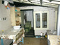 <I>There is a summer kitchen.</I>