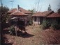 <I>Rear of house with outbuildings</I>