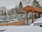 The backyard includes a pool, Jacuzzi and dining area. During the renovation, new landscaping, lighting and a granite-tile wall surrounding the property were installed