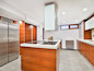 The main kitchen is in the finished basement, which also has enough room for a playroom or media room. The kitchen features stainless steel Miele appliances, an island with a built-in teppanyaki grill and a steam oven