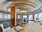 The concentric wood circles on the ceiling of the rotunda, which swirl to a skylight in the center, are one of the house’s most distinctive features