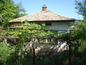 House for sale near Kyustendil. Sunlit rural home surrounded by a lovely garden of greenery