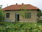 House for sale near Montana. Abandoned house with garden in a small town